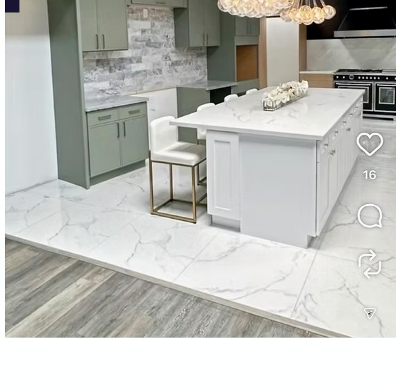 Modern kitchen remodel with chandelier and island seating