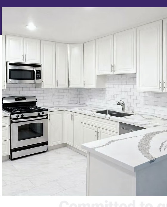 Bright kitchen remodel with white cabinetry